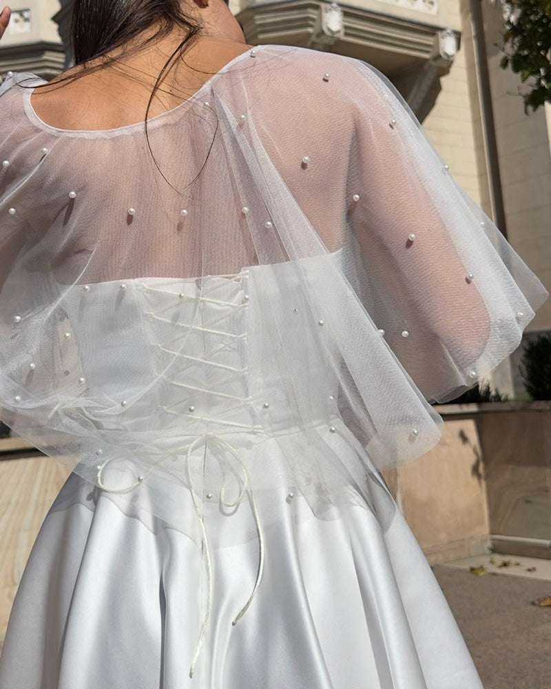 Bolero/cape din tulle cu perle – acoperire delicată pentru rochii de cununie